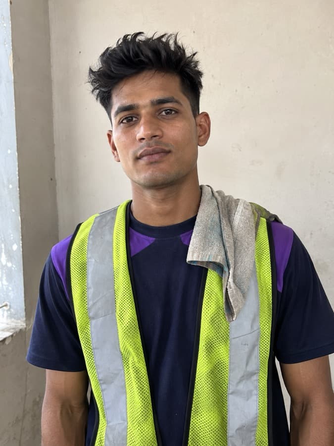 A CarYaar tow operator in a safety vest